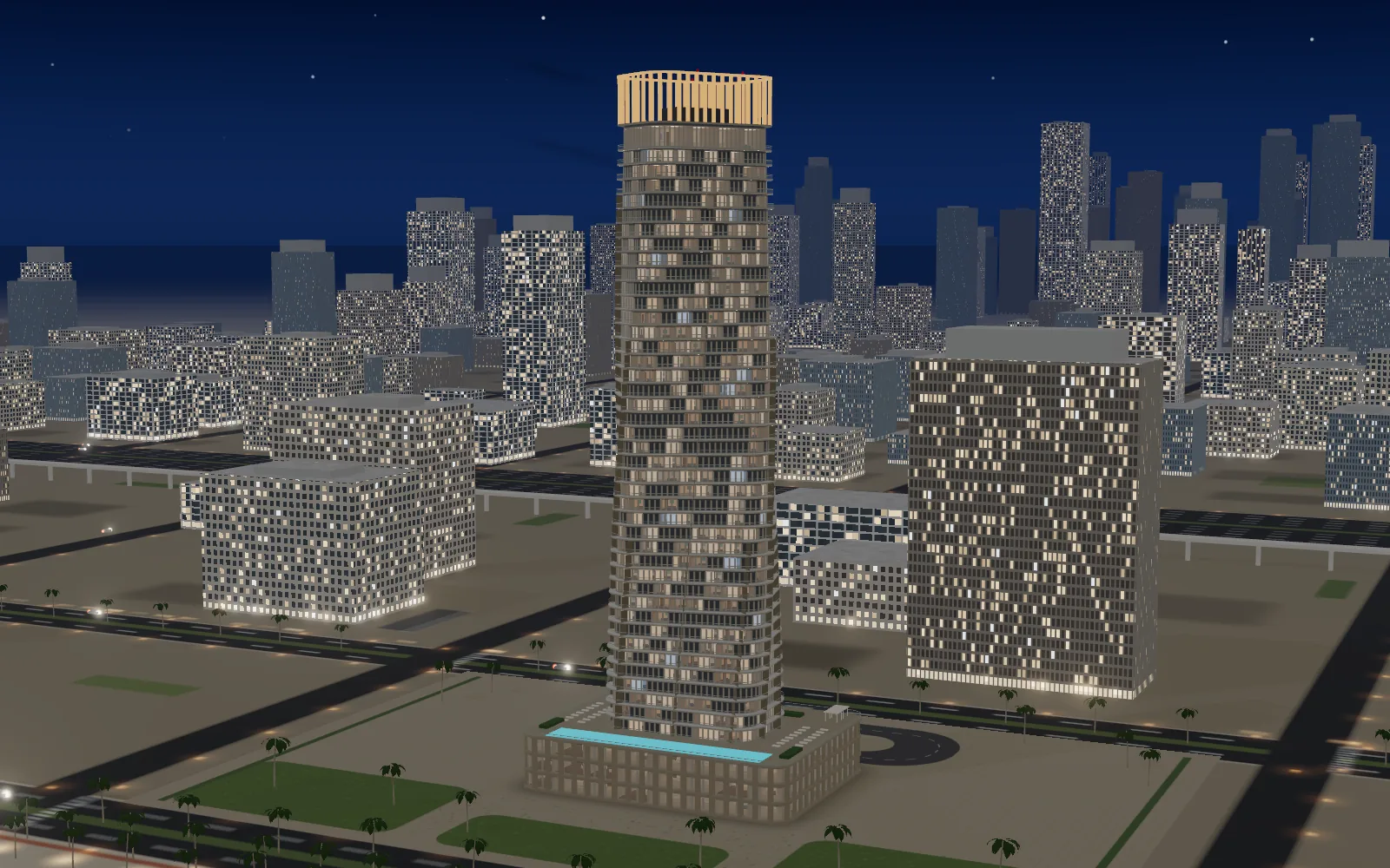 The tower lit at night above the city